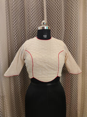 Ivory Backless Hakoba blouse with red piping and sleeves