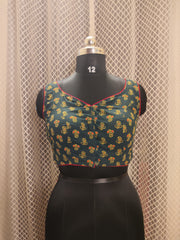 Bottle green Ajrakh backless sleeveless blouse with red piping