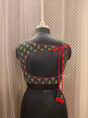 Bottle green Ajrakh backless sleeveless blouse with red piping