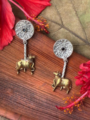 Silver replica dual tone nandi earring