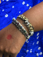 Dual tone silver replica elephant bangle