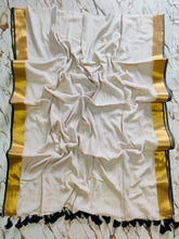 Black and gold bordered beige mul cotton saree