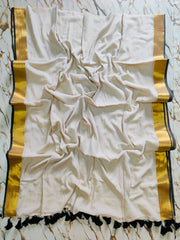 Black and gold bordered beige mul cotton saree