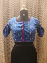 Blue Ikkat blouse with red piping