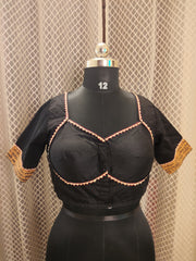 Black cotton blouse with embroidery and script patch work