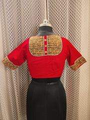 Red cotton blouse with embroidery and script patch work