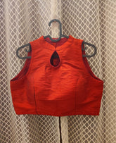 Deep burnt red semi silk sleeveless designer blouse