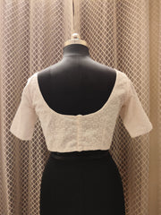White machine embroidered blouse