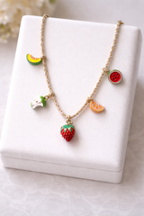 Enamelled fruits in string chain
