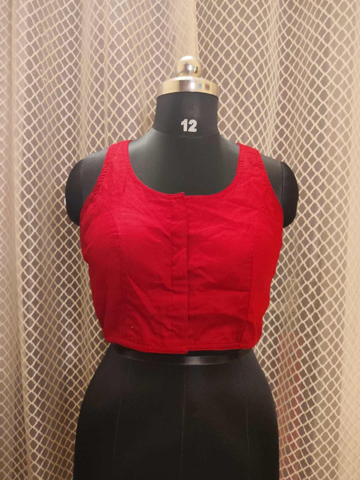Ajrakh aplique sleeveless blouse