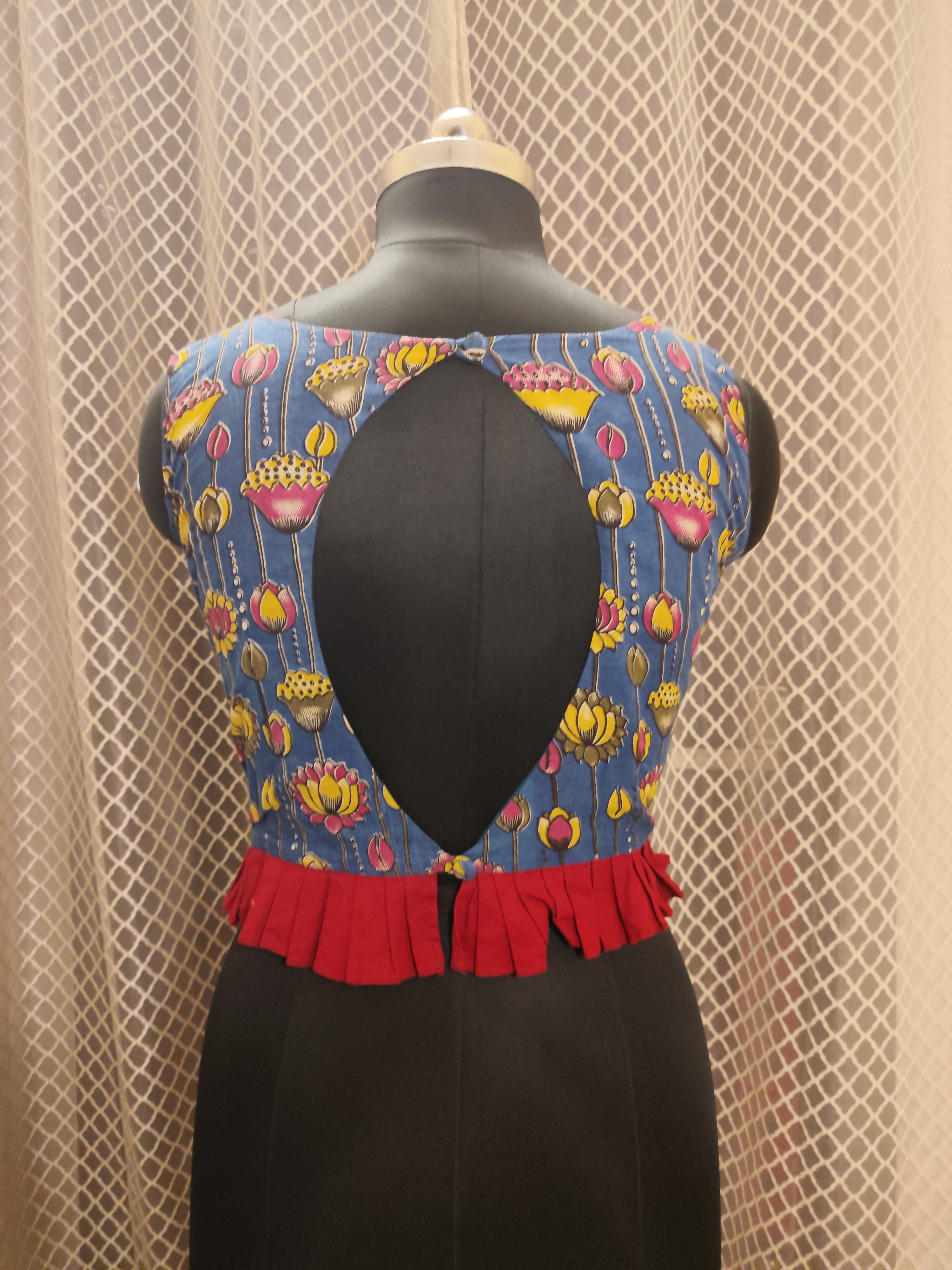 Printed sleeveless cotton blouse with frills