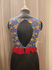 Printed sleeveless cotton blouse with frills