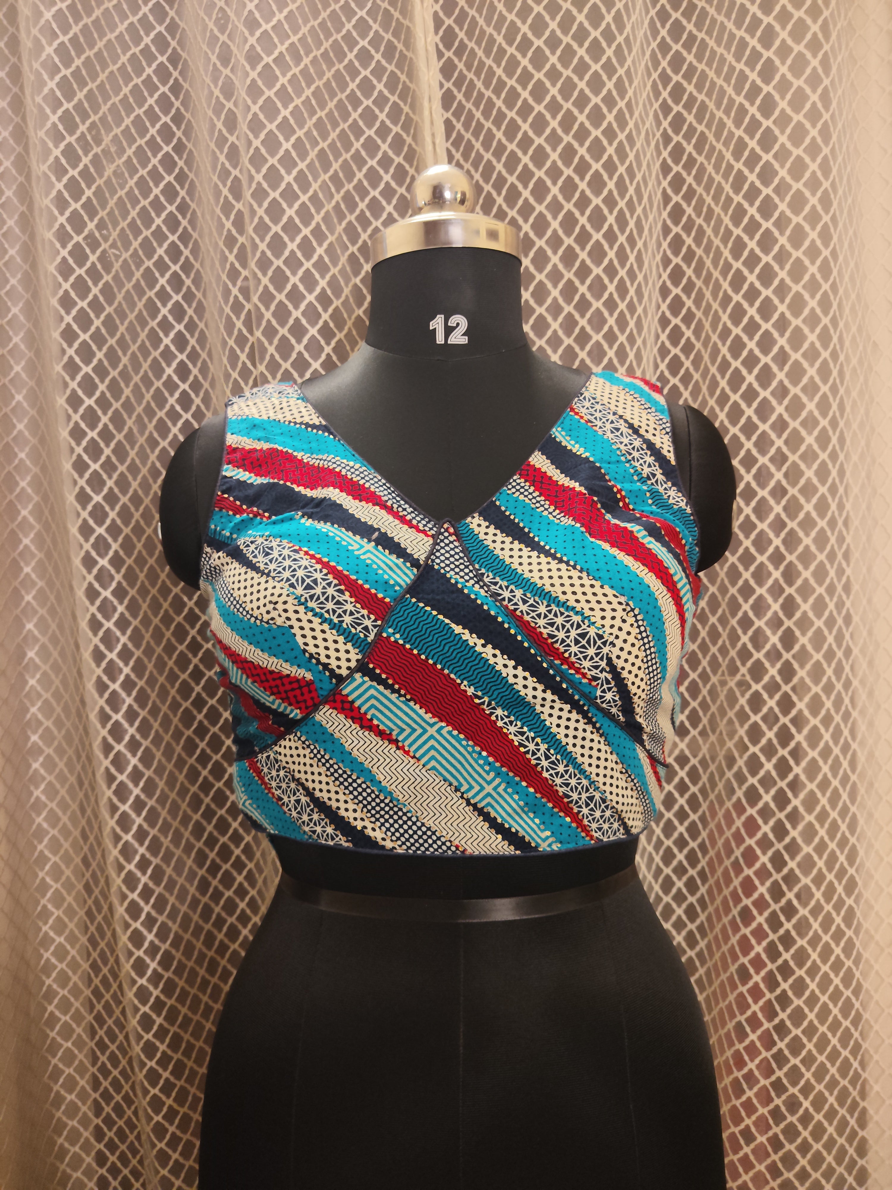 Printed cotton blouse with attached sleeves