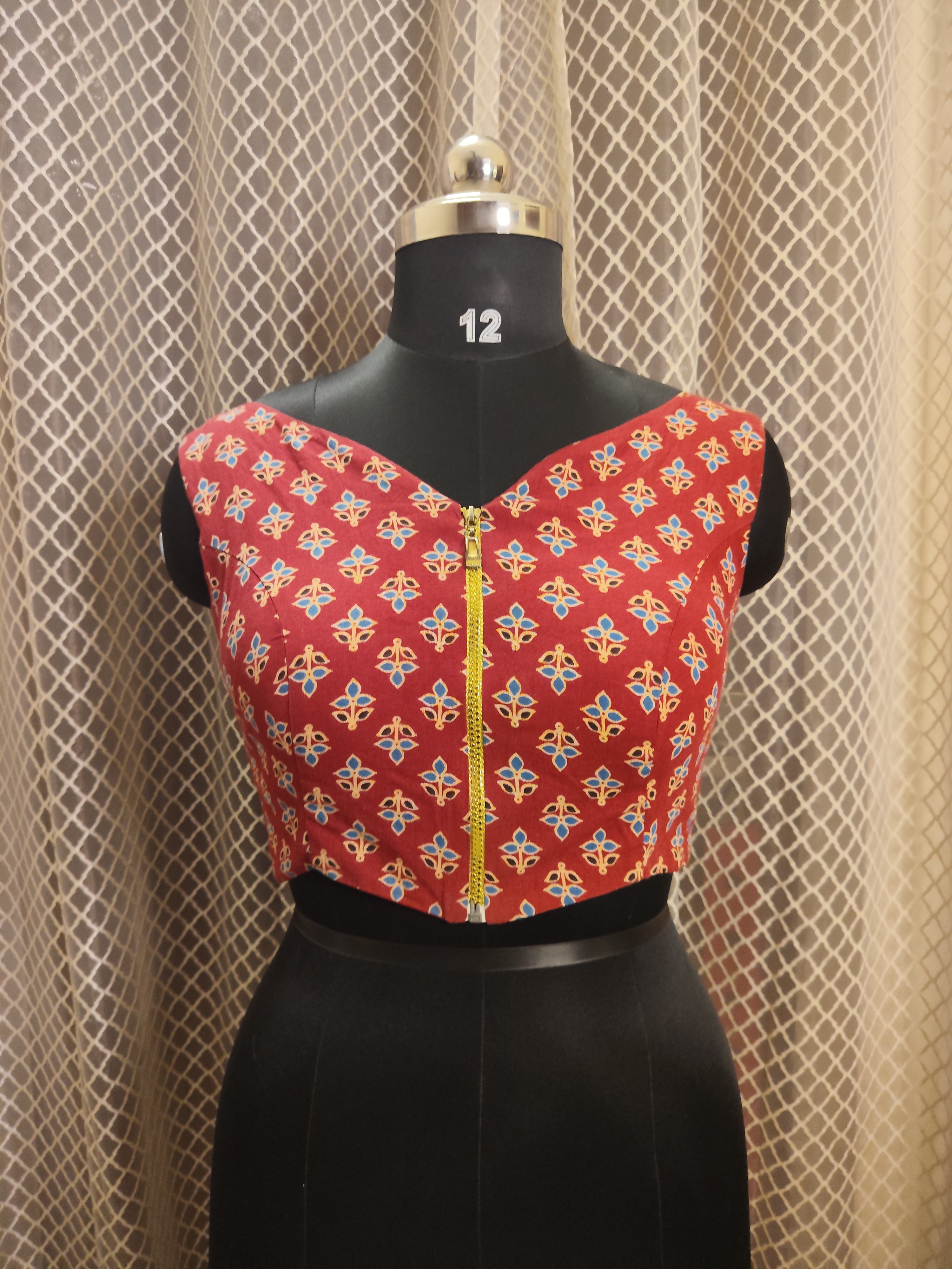 Ajrakh printed front zipped sleeveless cotton blouse