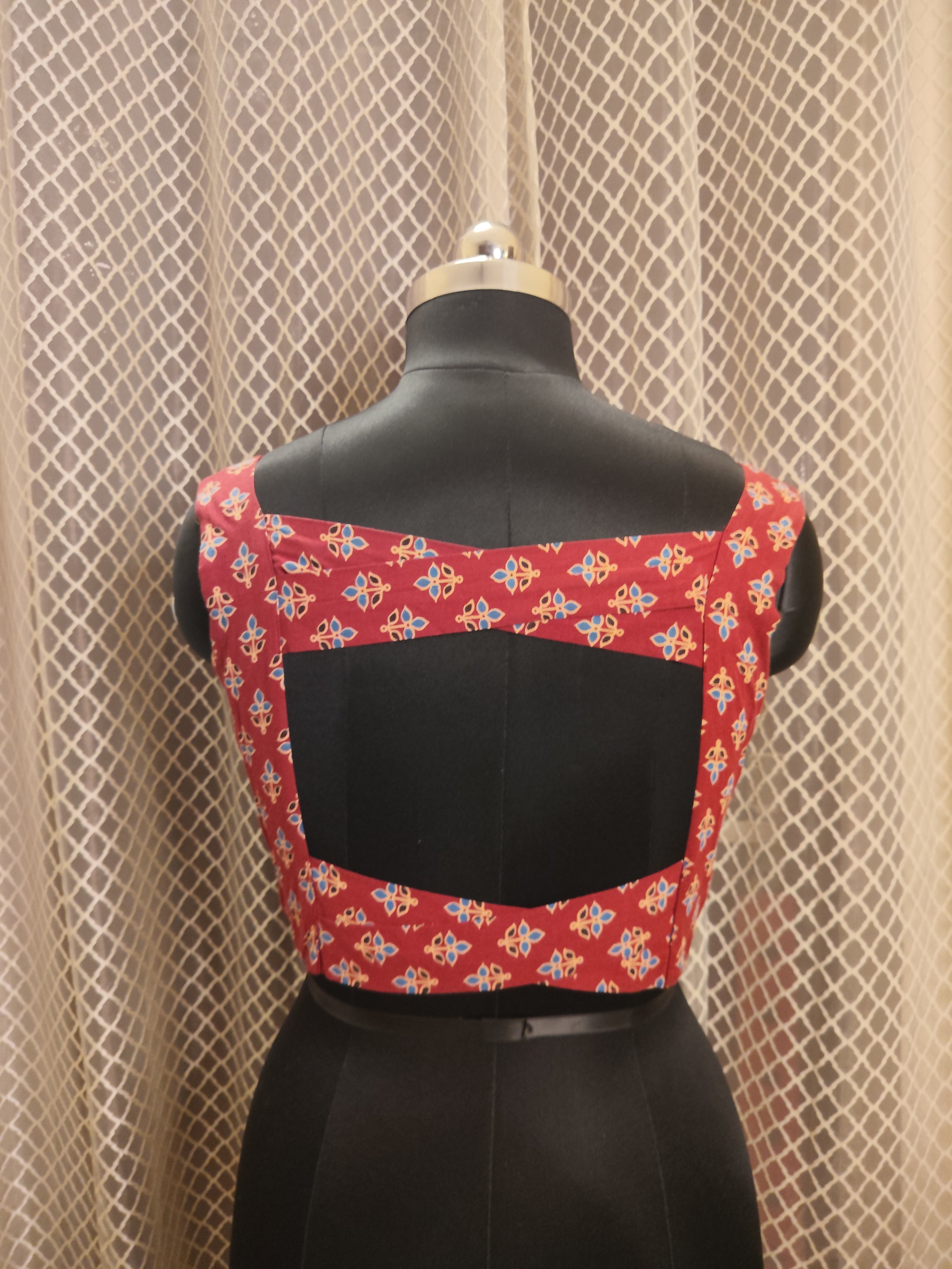 Ajrakh printed front zipped sleeveless cotton blouse