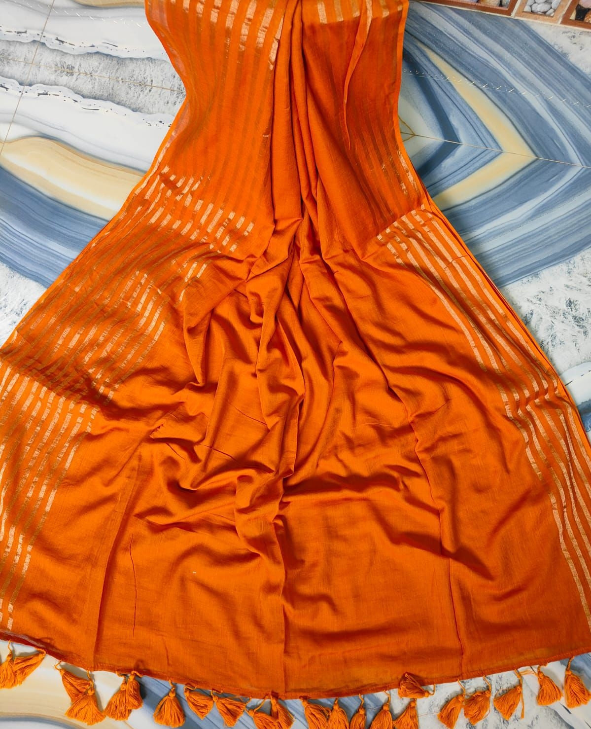 Golden bordered orange "Festive edit " of mul cotton saree
