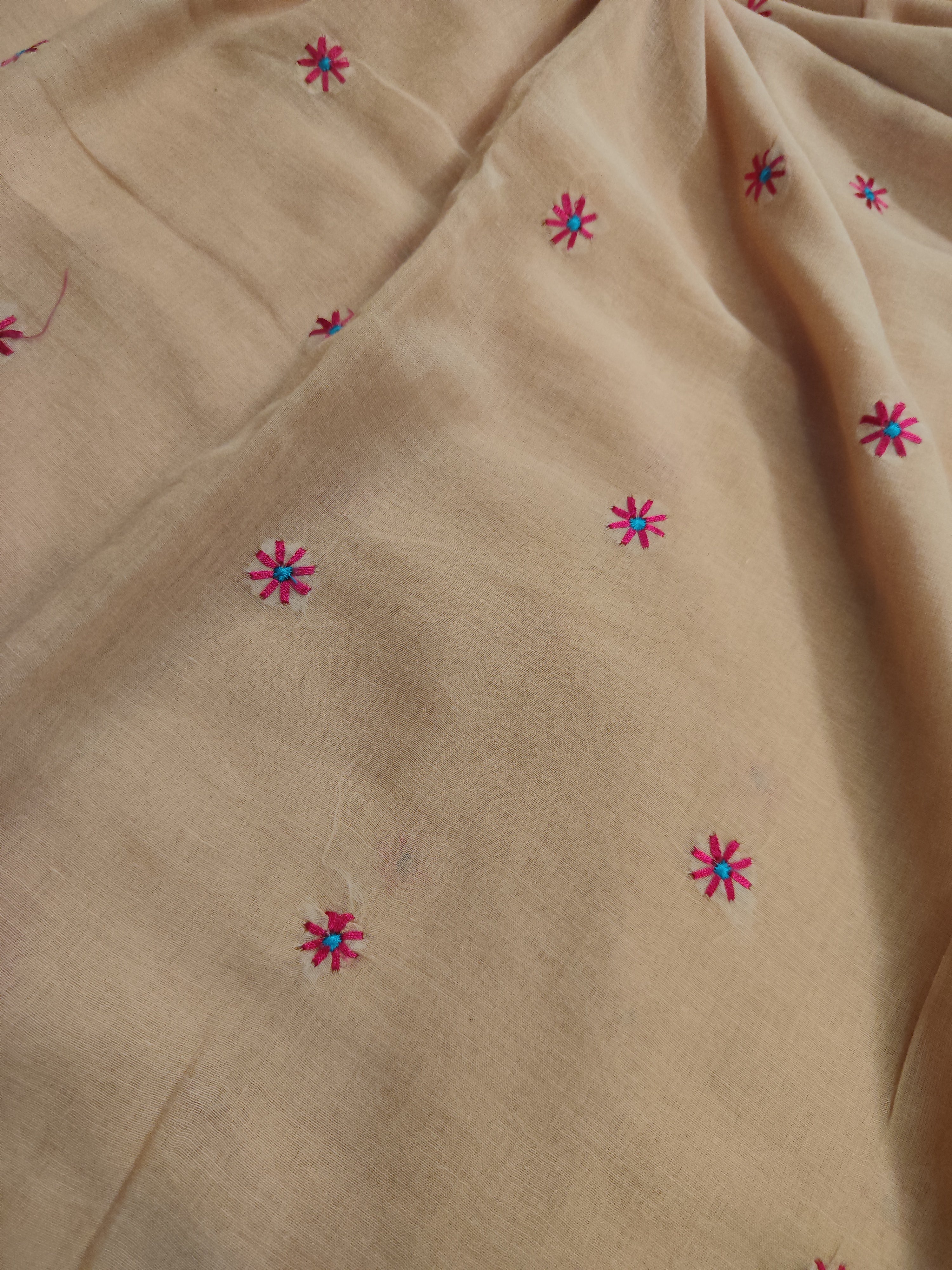 Biscuit mul saree with floral machine embroidery