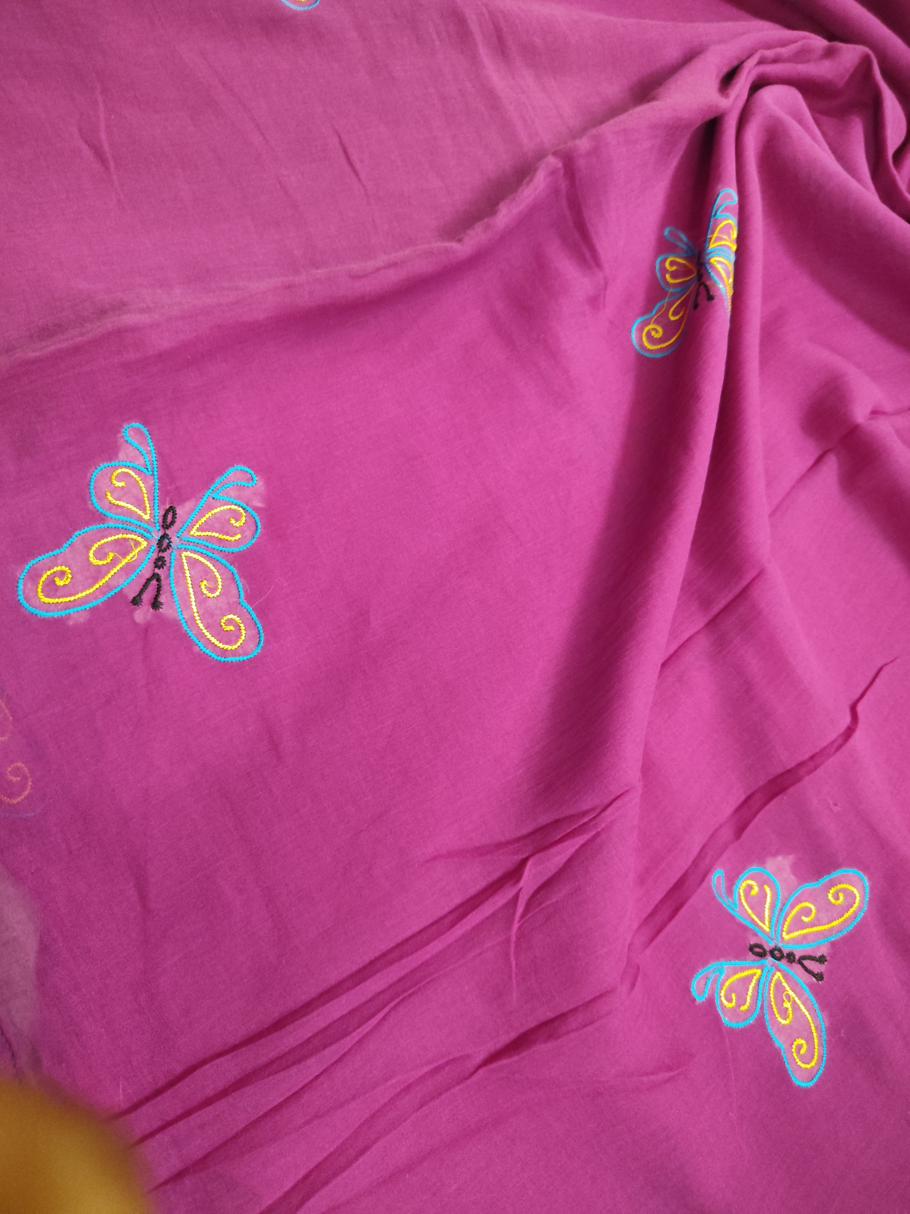 Magenta mul saree with butterfly embroidery