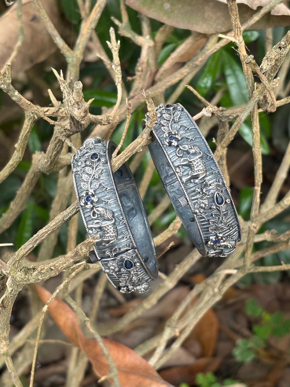 Silver replica  navy blue stone elephants bangle