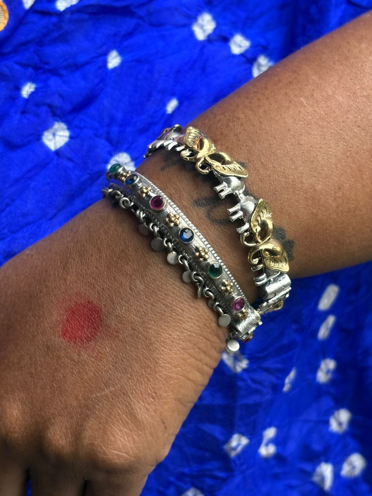 Dual tone silver replica elephant bangle