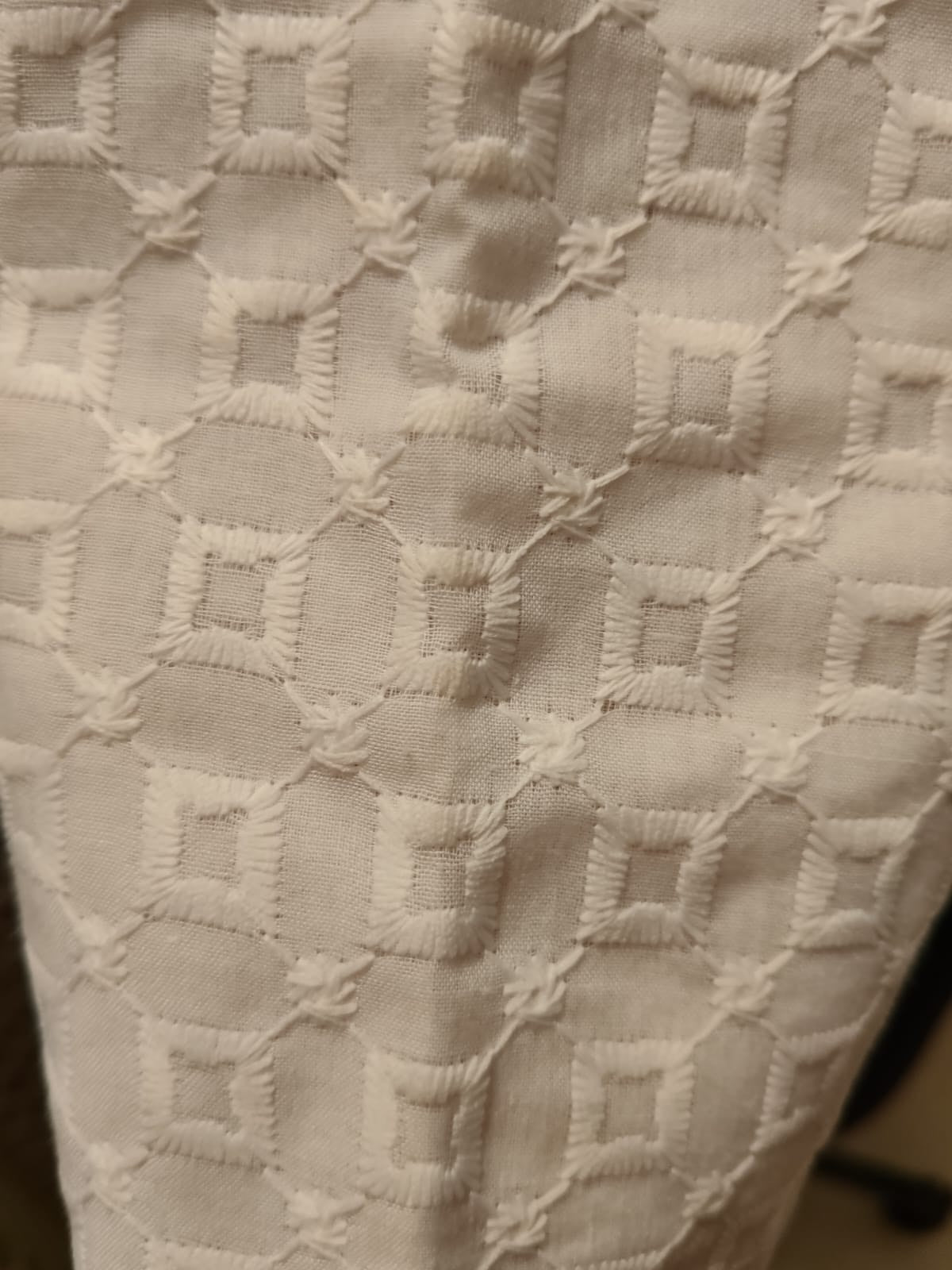 White machine embroidered blouse