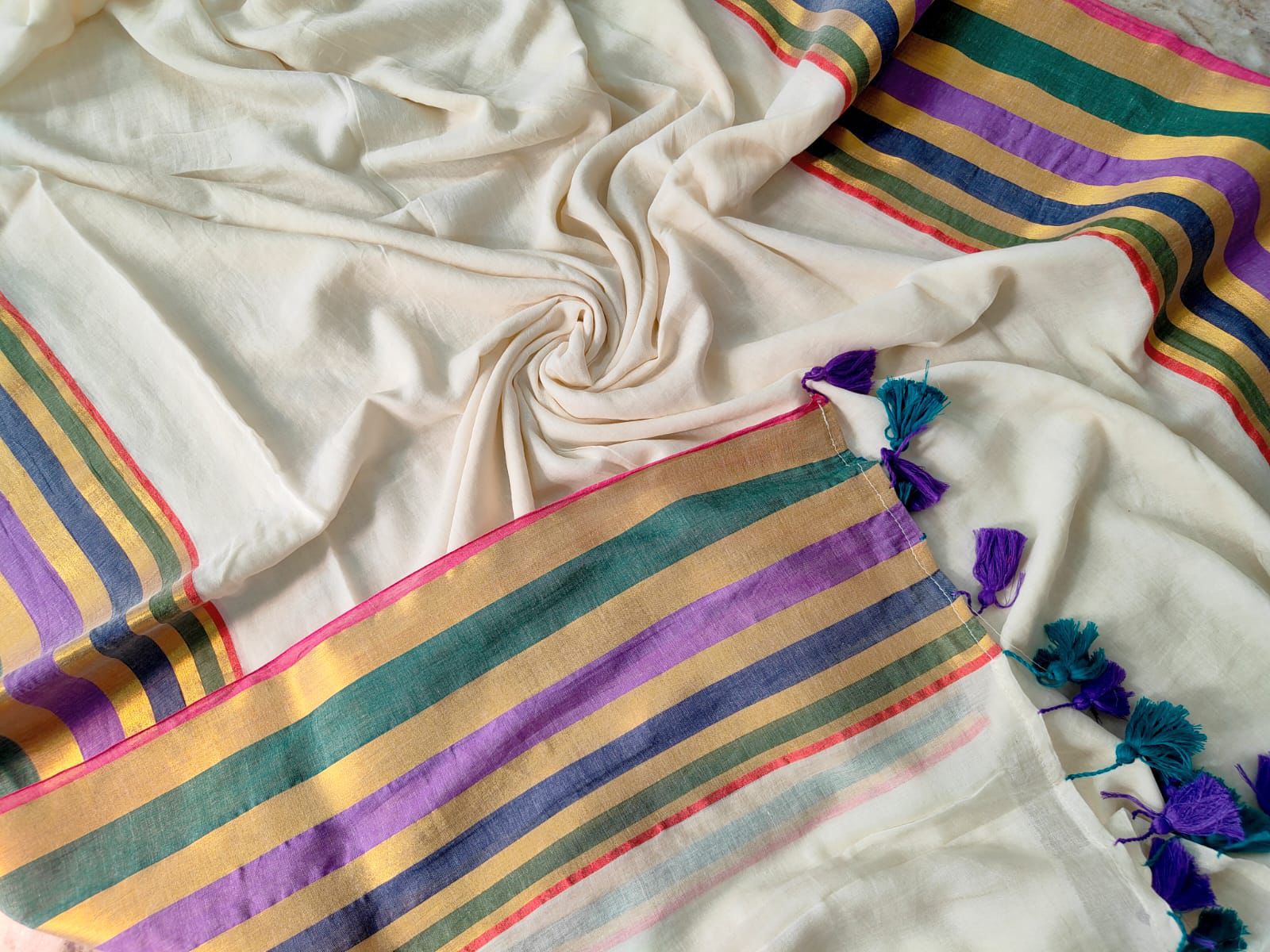 Multi gold bordered "Festive edit " of mul cotton saree