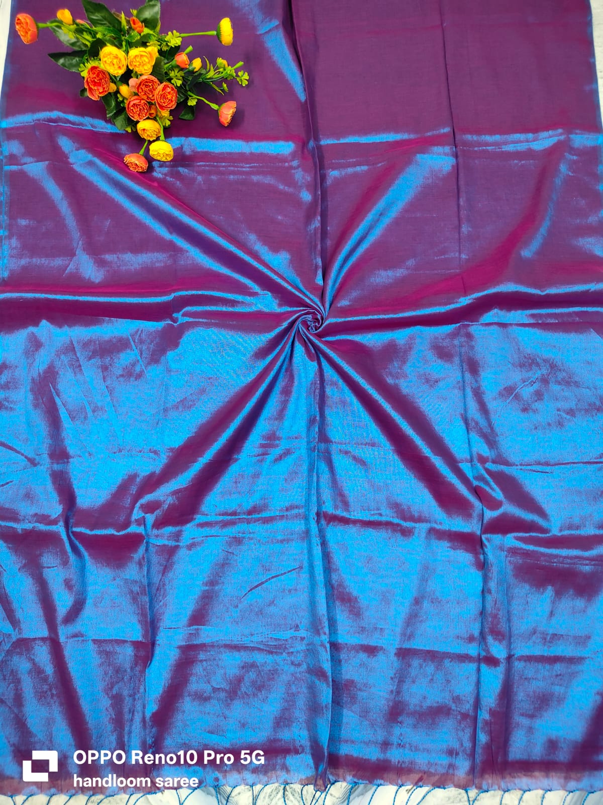 Dual tone " Molten Metals " collection of zari-mul saree