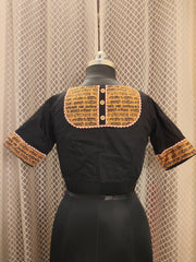 Black cotton blouse with embroidery and script patch work