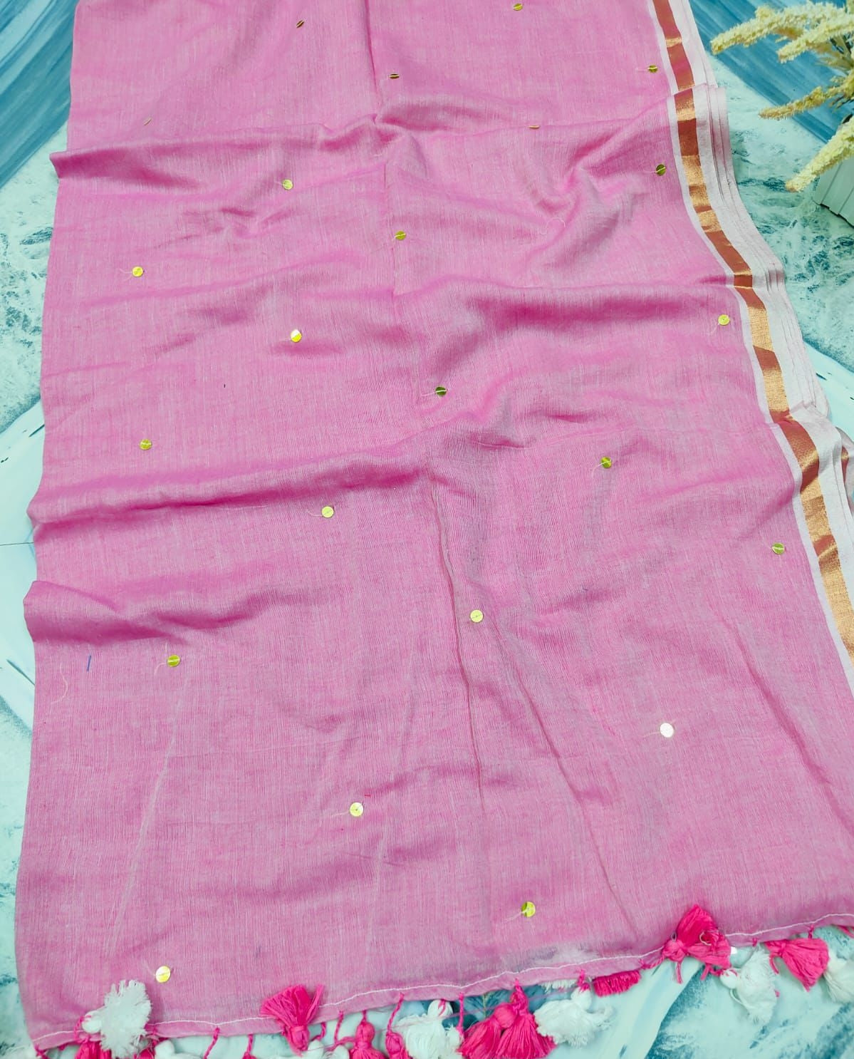 Golden bordered " Janvi " sequinned mul cotton saree