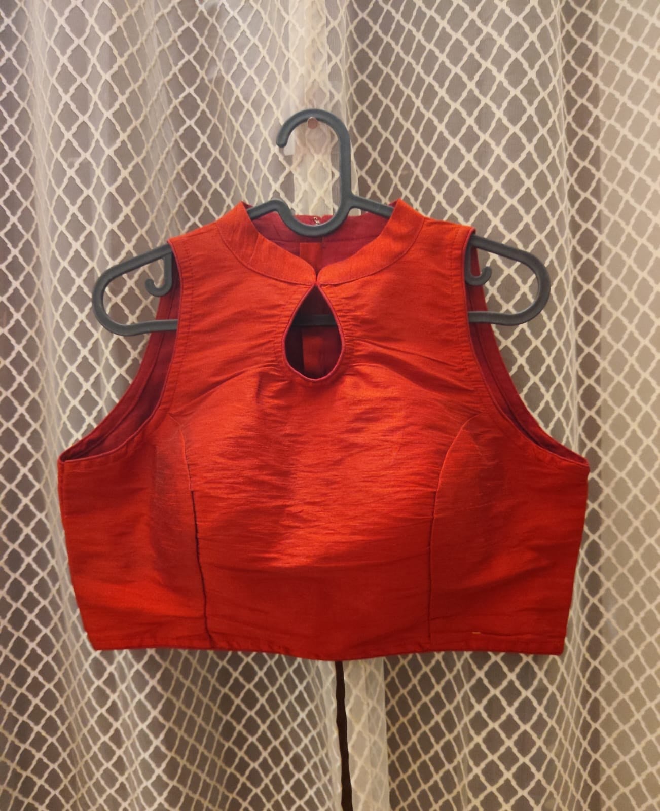 Deep burnt red semi silk sleeveless designer blouse