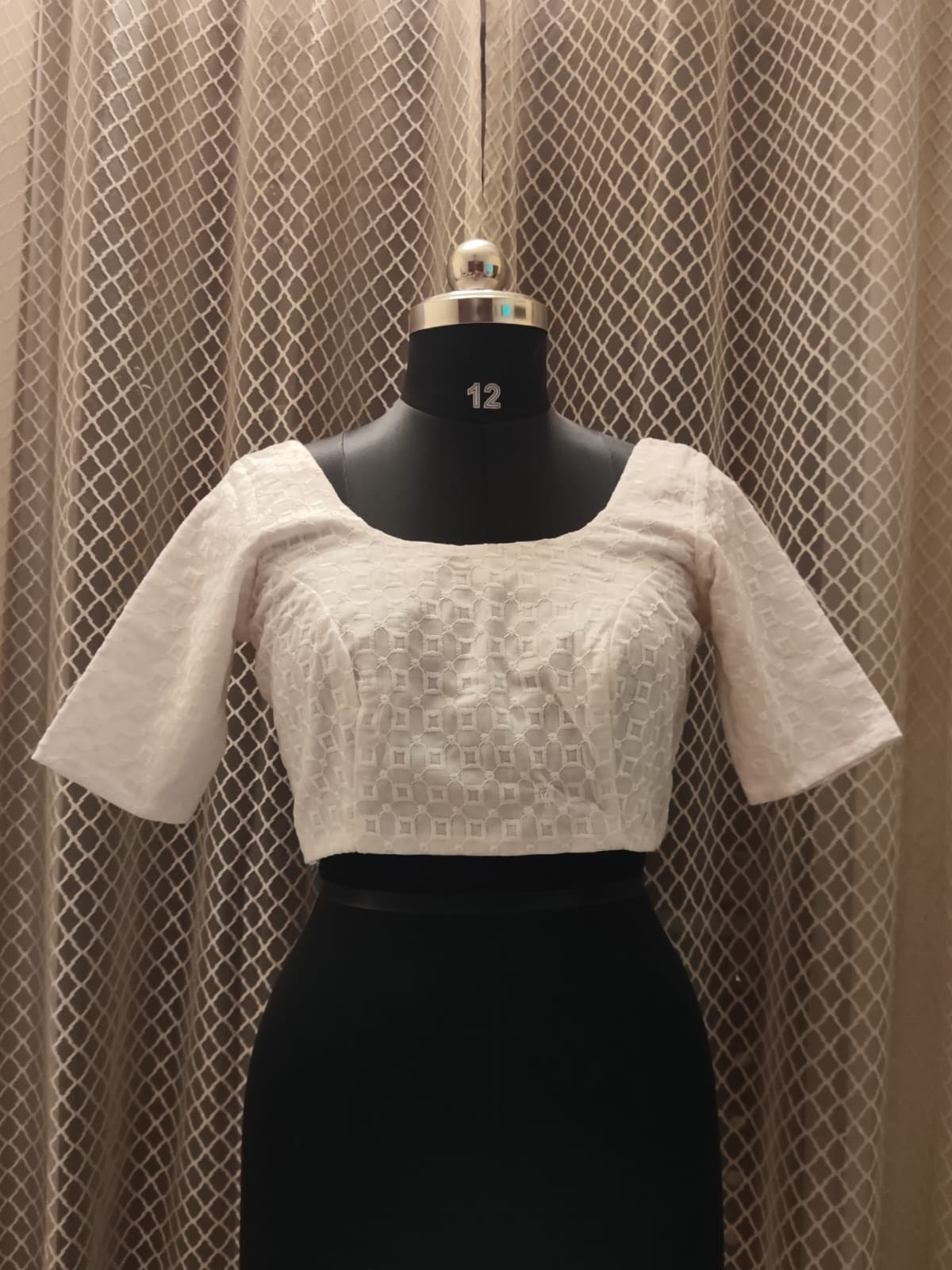 White machine embroidered blouse